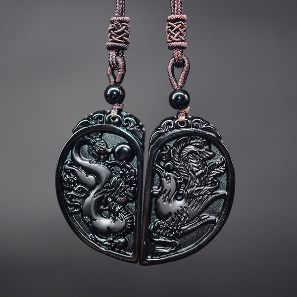Pair of Carved Obsidian Dragon and Phoenix Split Heart Pendants on Braided Cord Necklaces - Shelly Crag Imports