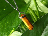 Tiger Eye Crystal Point Chakra Pendant in Steel Setting