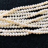 White Freshwater Potato Pearls, 15in Strand